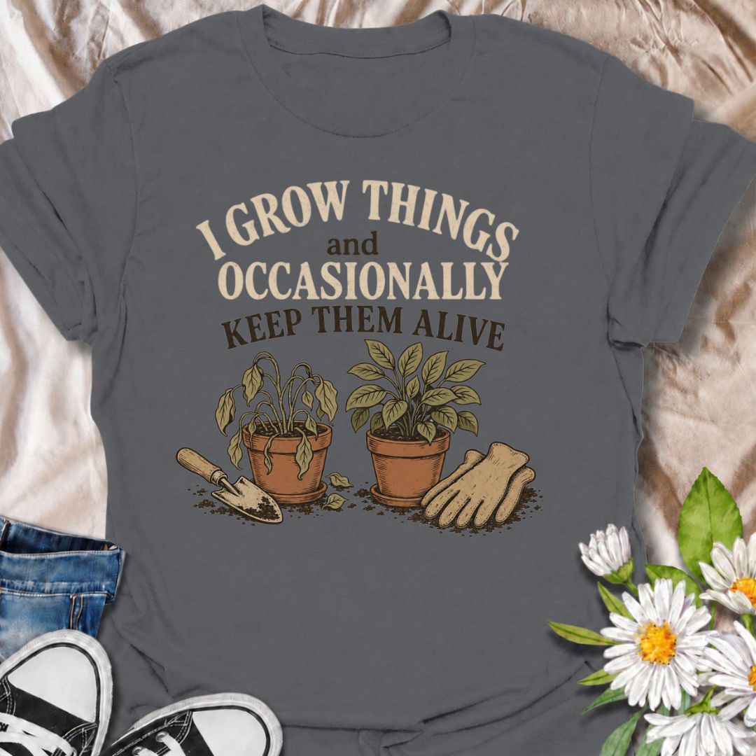 A funny gardening T-shirt for anyone who loves growing plants even when the results are a little unpredictable. The phrase “I Grow Things and Occasionally Keep Them Alive” delivers dry, self-deprecating humor that gardeners and plant lovers will instantly understand. Featuring two potted plants, gardening gloves, and a hand trowel, the design feels relaxed, relatable, and easy to wear. It makes a great gift for backyard gardeners, houseplant fans, and anyone whose green thumb works most of the time. Perfect