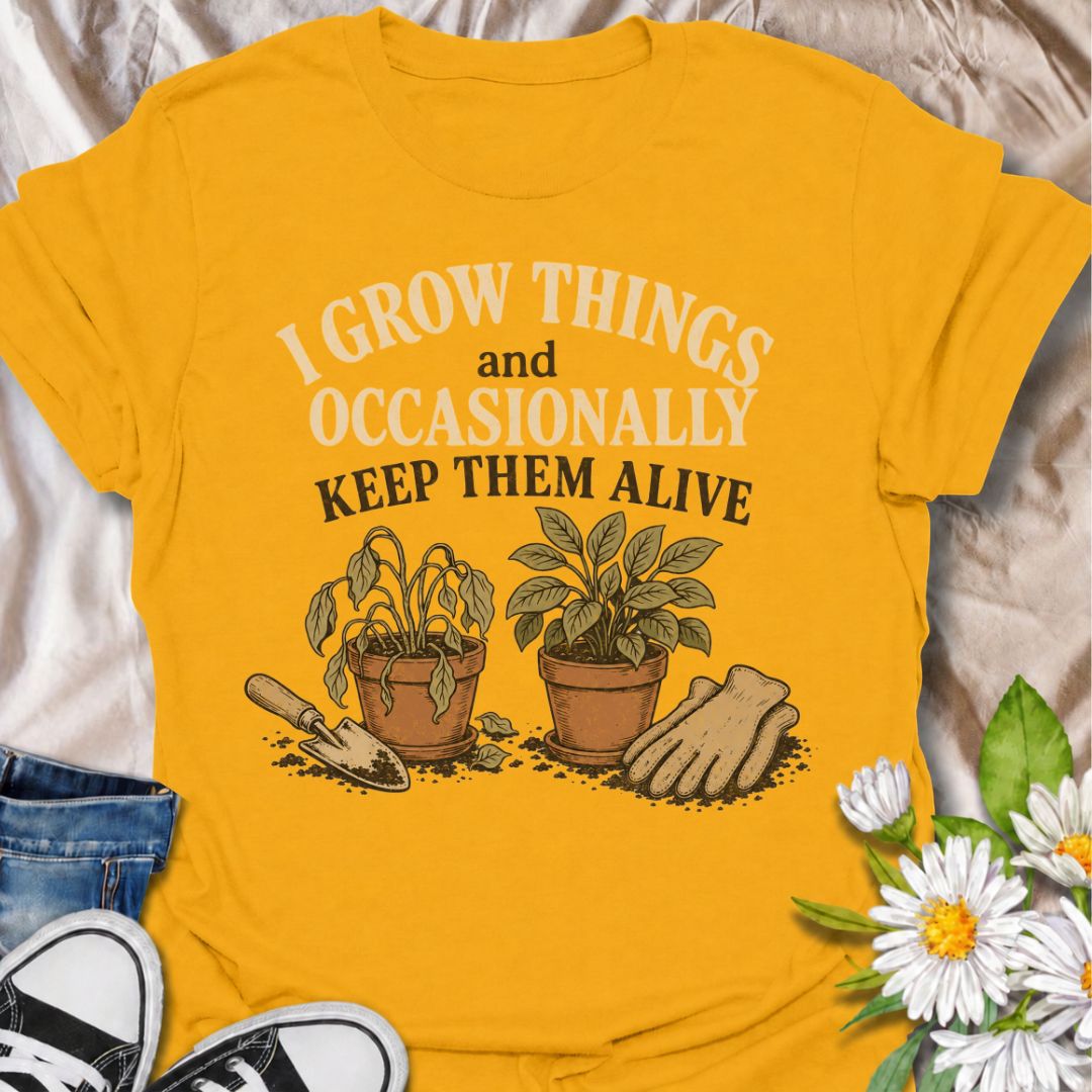 A funny gardening T-shirt for anyone who loves growing plants even when the results are a little unpredictable. The phrase “I Grow Things and Occasionally Keep Them Alive” delivers dry, self-deprecating humor that gardeners and plant lovers will instantly understand. Featuring two potted plants, gardening gloves, and a hand trowel, the design feels relaxed, relatable, and easy to wear. It makes a great gift for backyard gardeners, houseplant fans, and anyone whose green thumb works most of the time. Perfect