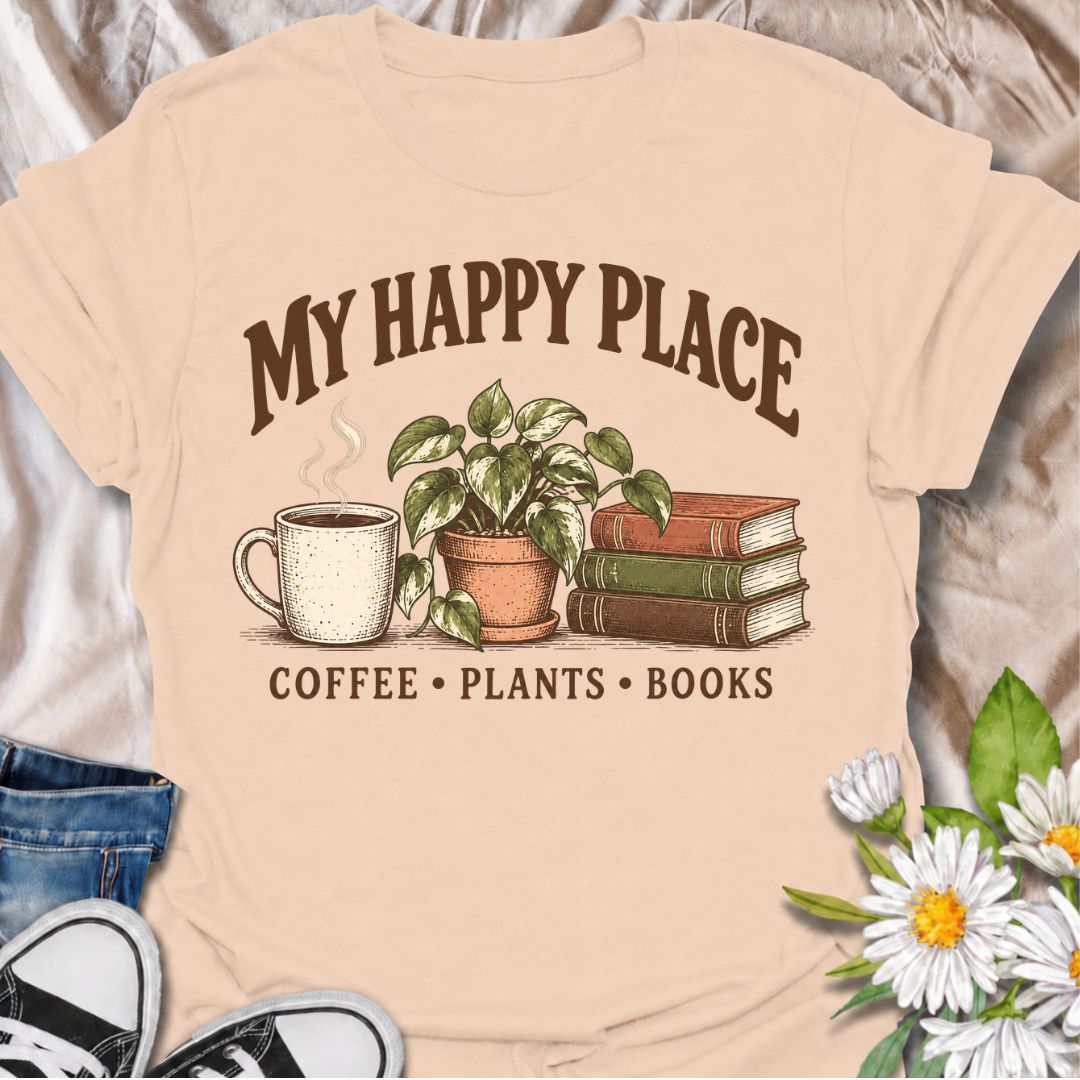 A cozy plant-lover T-shirt for anyone whose happy place includes coffee, houseplants, and a good book. The phrase “My Happy Place — Coffee • Plants • Books” pairs with a warm mug, leafy potted plant, and stacked books for an easygoing lifestyle design. It is perfect for readers, plant parents, indoor gardeners, and coffee lovers who enjoy quiet time at home. The vintage-inspired illustration gives the design a relaxed, thoughtful feel without becoming too busy. A great gift for book lovers, houseplant colle