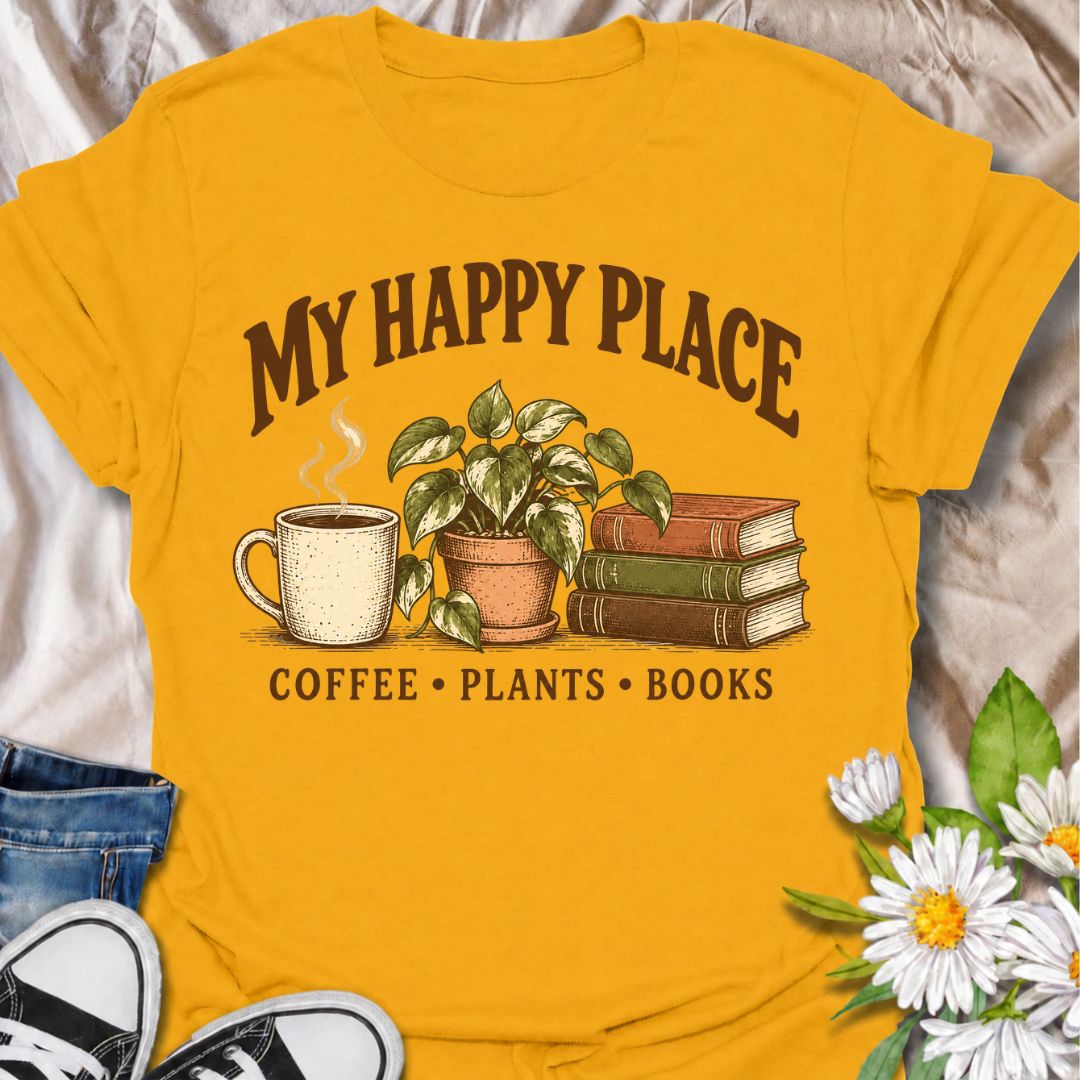 A cozy plant-lover T-shirt for anyone whose happy place includes coffee, houseplants, and a good book. The phrase “My Happy Place — Coffee • Plants • Books” pairs with a warm mug, leafy potted plant, and stacked books for an easygoing lifestyle design. It is perfect for readers, plant parents, indoor gardeners, and coffee lovers who enjoy quiet time at home. The vintage-inspired illustration gives the design a relaxed, thoughtful feel without becoming too busy. A great gift for book lovers, houseplant colle