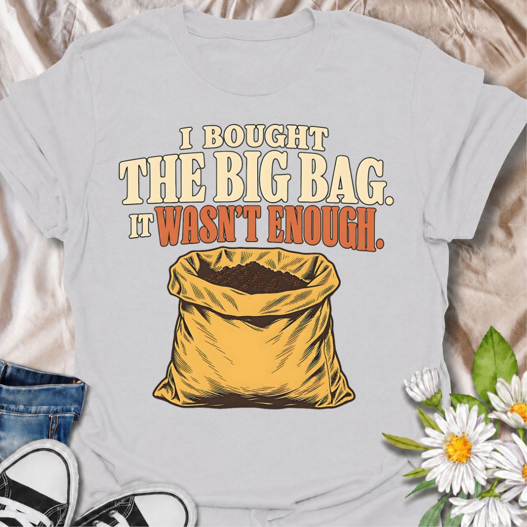 A funny gardening T-shirt for anyone who confidently bought the large bag of soil, compost, or potting mix and still somehow ran out. The phrase “I Bought the Big Bag. It Wasn’t Enough.” captures a familiar gardening problem with simple, relatable humor. Featuring a bold vintage-style sack illustration, the design is perfect for gardeners, plant lovers, and anyone tackling bigger planting jobs than originally planned. It makes a great gift for backyard gardeners, container growers, vegetable gardeners, and 