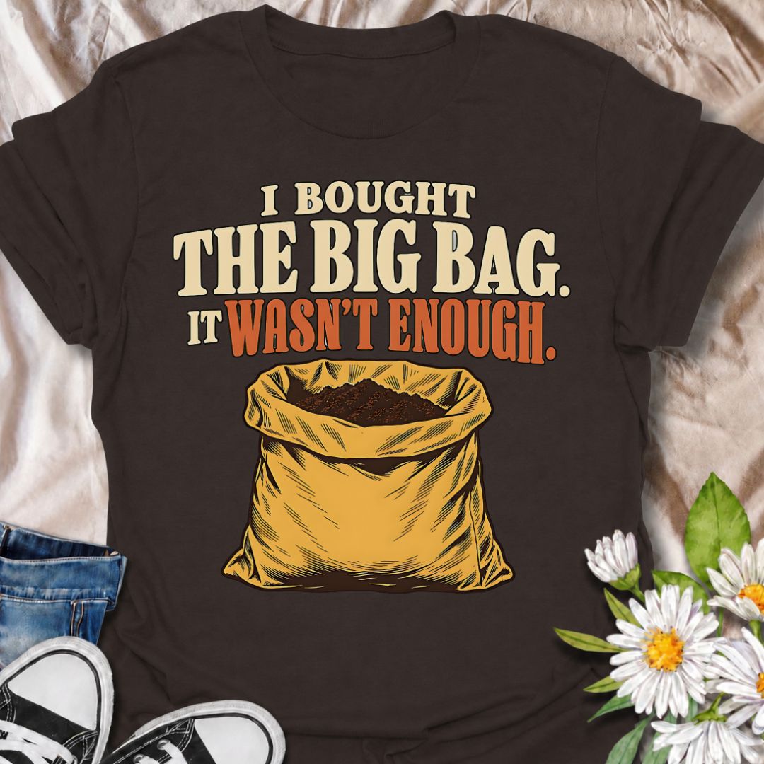 A funny gardening T-shirt for anyone who confidently bought the large bag of soil, compost, or potting mix and still somehow ran out. The phrase “I Bought the Big Bag. It Wasn’t Enough.” captures a familiar gardening problem with simple, relatable humor. Featuring a bold vintage-style sack illustration, the design is perfect for gardeners, plant lovers, and anyone tackling bigger planting jobs than originally planned. It makes a great gift for backyard gardeners, container growers, vegetable gardeners, and 