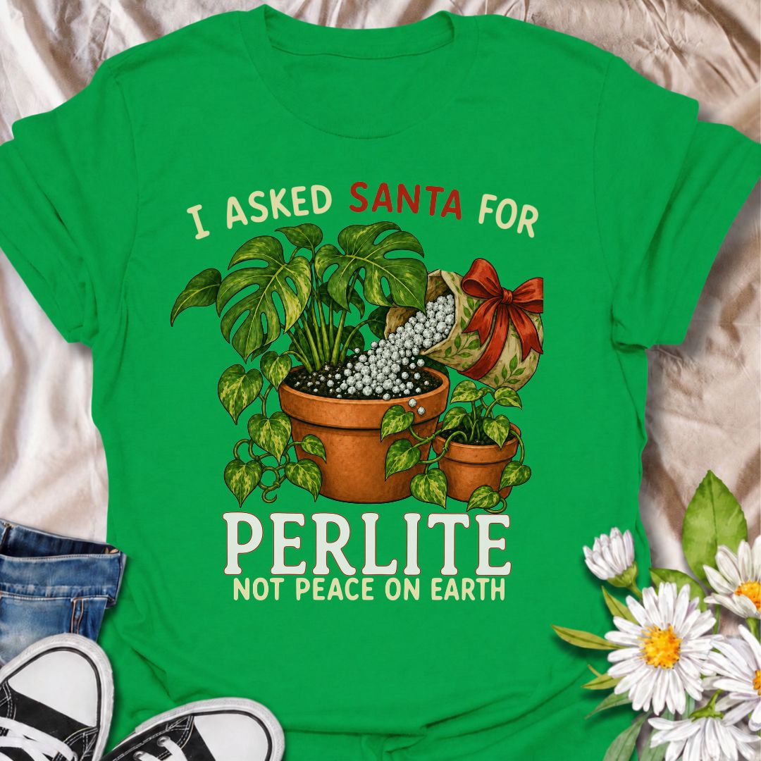 A funny Christmas plant T-shirt for houseplant lovers who would rather find gardening supplies under the tree than another ordinary gift. The phrase “I Asked Santa for Perlite, Not Peace on Earth” pairs with lush potted plants and a festive bag of perlite for niche holiday plant humor. It is perfect for plant parents, indoor gardeners, propagation fans, and anyone who takes their potting mix very seriously. The Christmas colors and botanical artwork make it festive without losing the plant-lover personality