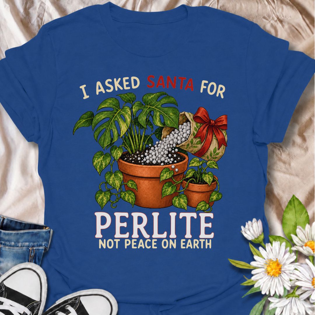 A funny Christmas plant T-shirt for houseplant lovers who would rather find gardening supplies under the tree than another ordinary gift. The phrase “I Asked Santa for Perlite, Not Peace on Earth” pairs with lush potted plants and a festive bag of perlite for niche holiday plant humor. It is perfect for plant parents, indoor gardeners, propagation fans, and anyone who takes their potting mix very seriously. The Christmas colors and botanical artwork make it festive without losing the plant-lover personality