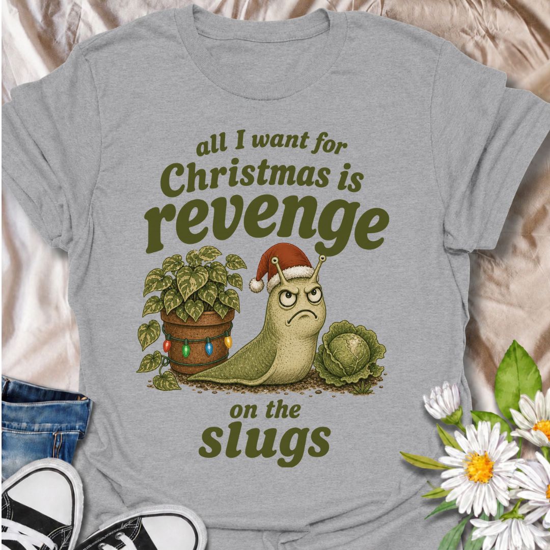 A funny Christmas gardening T-shirt for anyone who has spent the growing season battling slugs and has not forgotten about it. The phrase “All I Want for Christmas Is Revenge on the Slugs” pairs with a gloriously grumpy slug in a Santa hat for sharp, gardener-specific holiday humor. It is perfect for vegetable gardeners, flower growers, allotment gardeners, and anyone who has lost prized plants to hungry garden pests. The vintage-style illustration gives the design plenty of charm while keeping the joke won