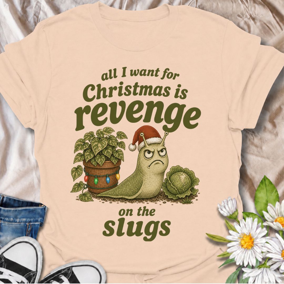A funny Christmas gardening T-shirt for anyone who has spent the growing season battling slugs and has not forgotten about it. The phrase “All I Want for Christmas Is Revenge on the Slugs” pairs with a gloriously grumpy slug in a Santa hat for sharp, gardener-specific holiday humor. It is perfect for vegetable gardeners, flower growers, allotment gardeners, and anyone who has lost prized plants to hungry garden pests. The vintage-style illustration gives the design plenty of charm while keeping the joke won