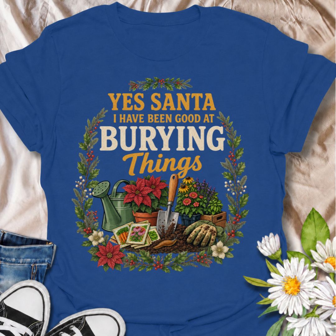 A funny Christmas gardening T-shirt for anyone whose definition of “being good” involves plenty of digging, planting, and burying things in the garden. The phrase “Yes Santa, I Have Been Good at Burying Things” combines festive humor with seed packets, garden tools, flowers, soil, and holiday foliage. It is perfect for backyard gardeners, flower growers, vegetable gardeners, and anyone who spends more time digging than decorating. The detailed vintage-style artwork gives it a full festive look while staying