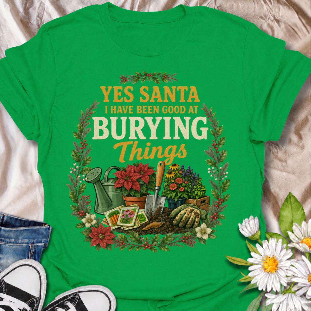 A funny Christmas gardening T-shirt for anyone whose definition of “being good” involves plenty of digging, planting, and burying things in the garden. The phrase “Yes Santa, I Have Been Good at Burying Things” combines festive humor with seed packets, garden tools, flowers, soil, and holiday foliage. It is perfect for backyard gardeners, flower growers, vegetable gardeners, and anyone who spends more time digging than decorating. The detailed vintage-style artwork gives it a full festive look while staying