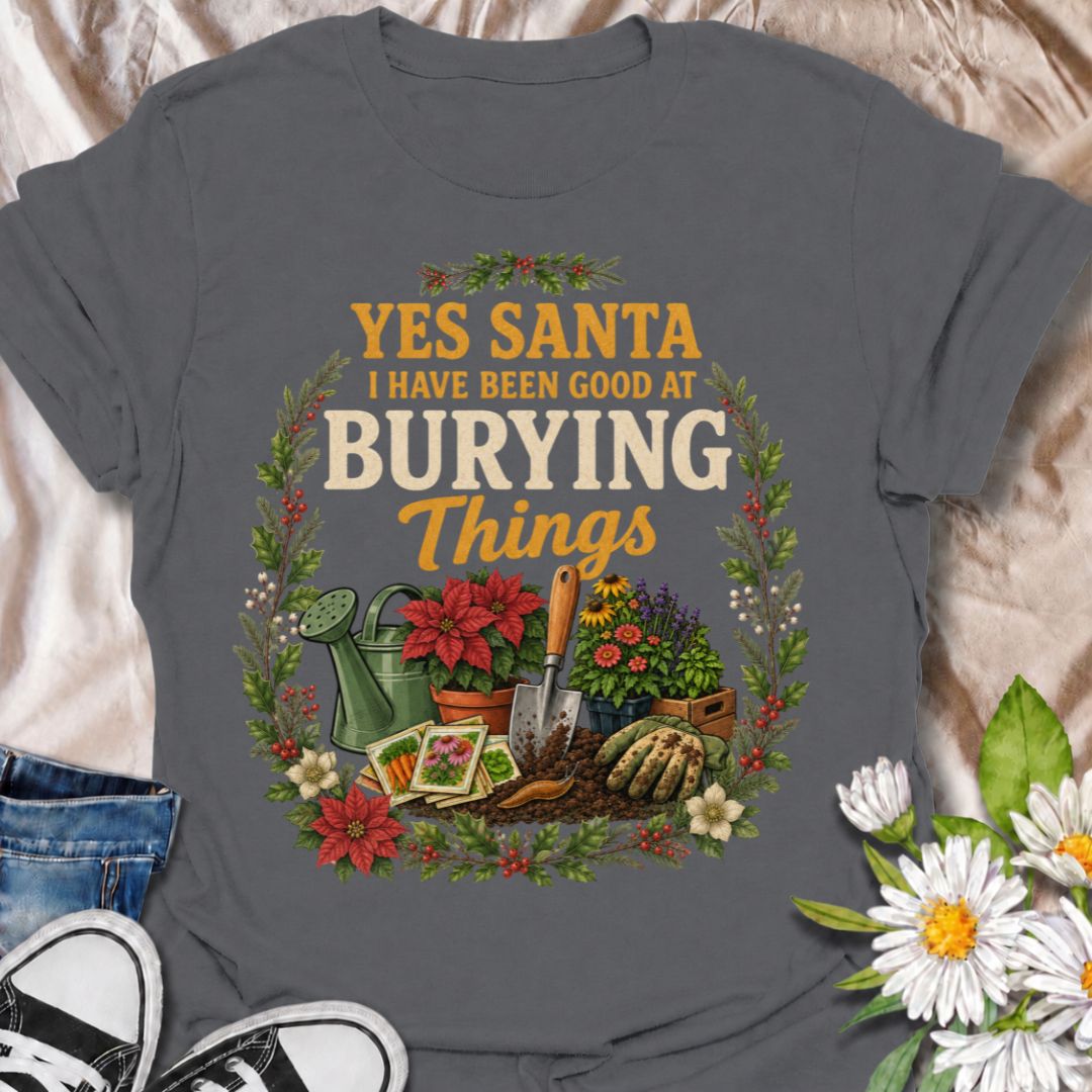 A funny Christmas gardening T-shirt for anyone whose definition of “being good” involves plenty of digging, planting, and burying things in the garden. The phrase “Yes Santa, I Have Been Good at Burying Things” combines festive humor with seed packets, garden tools, flowers, soil, and holiday foliage. It is perfect for backyard gardeners, flower growers, vegetable gardeners, and anyone who spends more time digging than decorating. The detailed vintage-style artwork gives it a full festive look while staying