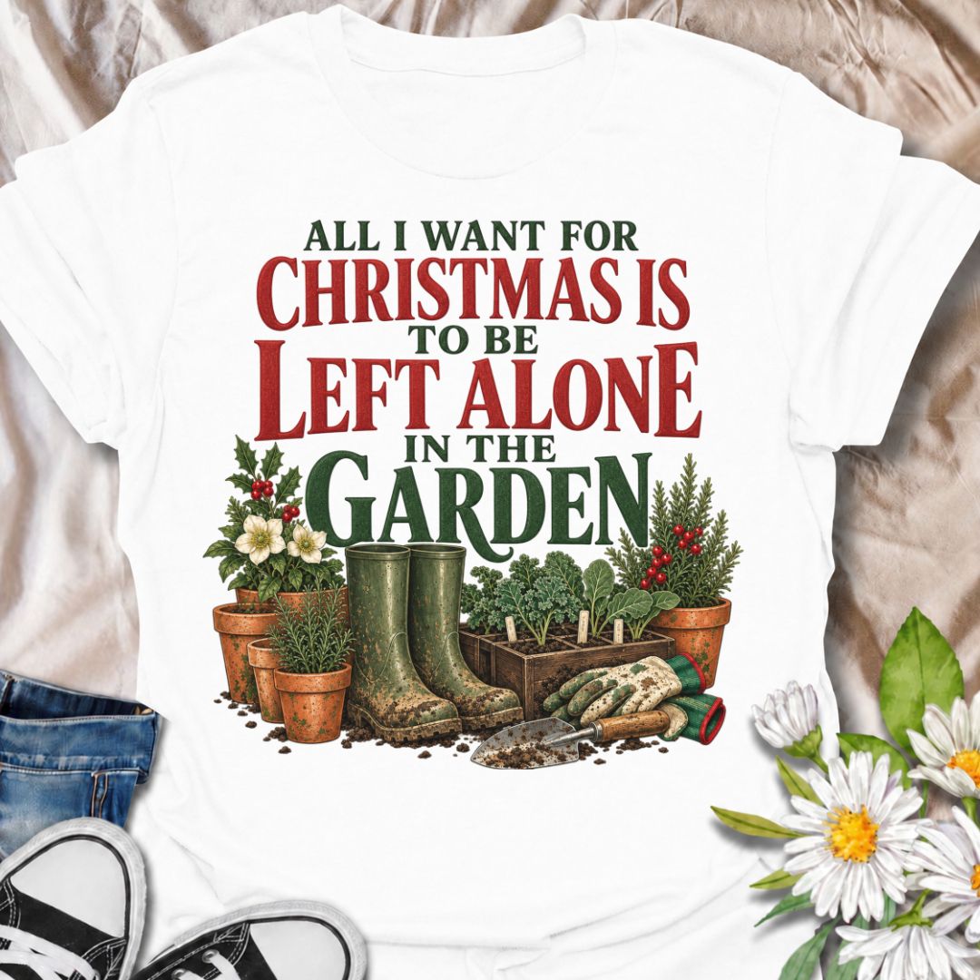 A funny Christmas gardening T-shirt for anyone whose perfect holiday involves escaping outside and being left alone with the plants. The phrase “All I Want for Christmas Is to Be Left Alone in the Garden” pairs with muddy wellies, gloves, a hand trowel, herbs, and festive holly for a design made especially for real gardeners. It is perfect for backyard gardeners, flower growers, vegetable gardeners, and anyone who would rather spend Christmas pottering outside than making small talk indoors. The vintage-sty