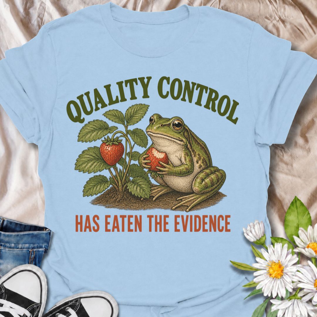 A funny gardening T-shirt for anyone who knows the garden’s unofficial quality-control inspector usually gets there first. The phrase “Quality Control Has Eaten the Evidence” pairs with a smug frog and strawberry plant for a playful, relatable take on garden wildlife. It is perfect for strawberry growers, backyard gardeners, frog lovers, and anyone who has lost part of the harvest before picking time. The vintage-style illustration gives the design plenty of character while keeping the joke clear and easy t