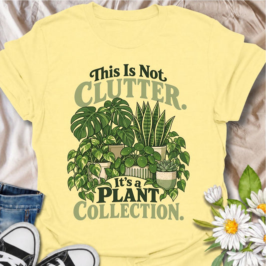 A funny houseplant T-shirt for anyone who insists their ever-growing greenery is a collection, not clutter. The phrase “This Is Not Clutter. It’s a Plant Collection.” pairs with a lush group of monstera, snake plants, pothos, pilea, and succulents for an instantly recognizable plant-lover design. It is perfect for plant parents, indoor gardeners, and houseplant collectors whose shelves and surfaces have slowly disappeared beneath pots. The bold botanical artwork keeps the design colorful, niche, and easy to