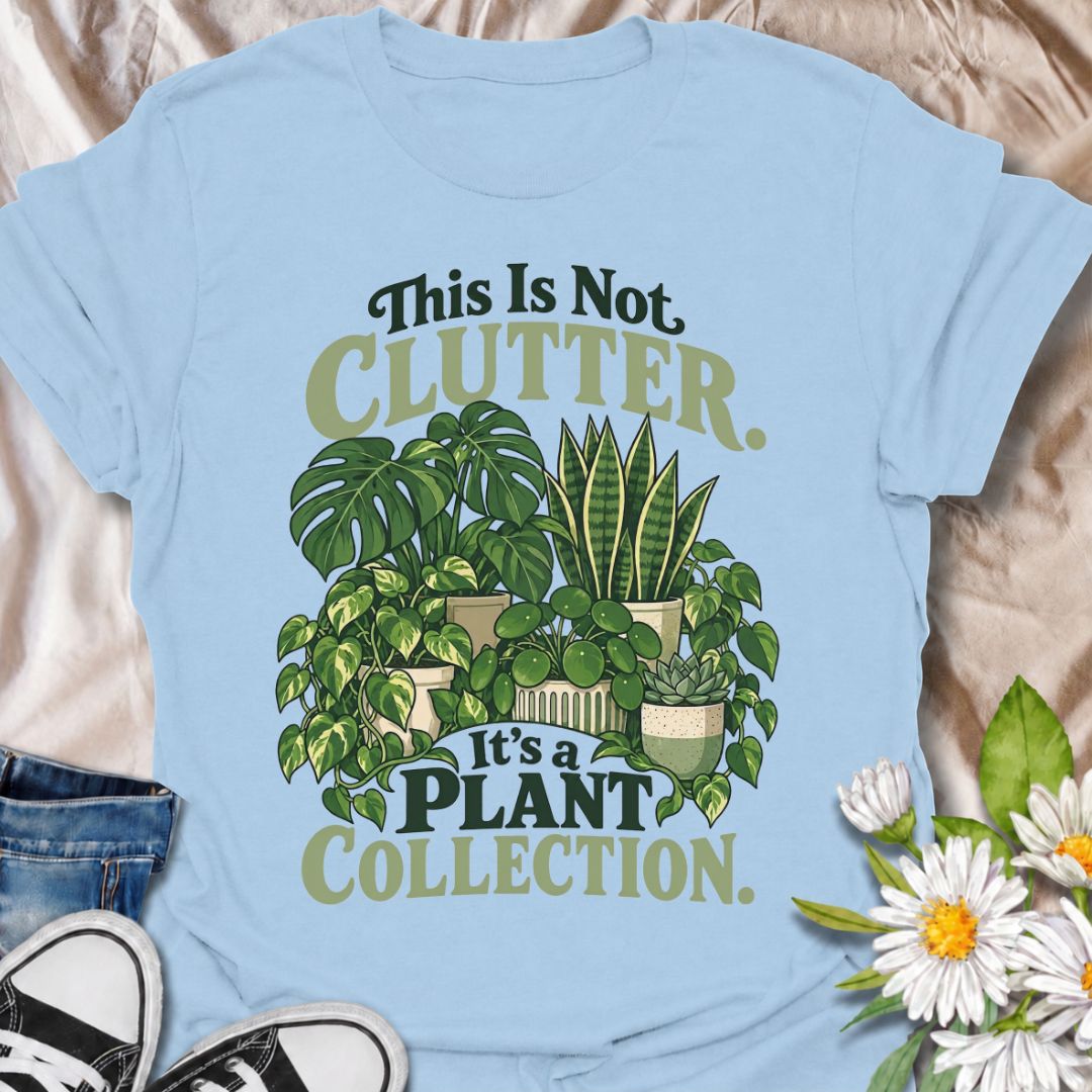 A funny houseplant T-shirt for anyone who insists their ever-growing greenery is a collection, not clutter. The phrase “This Is Not Clutter. It’s a Plant Collection.” pairs with a lush group of monstera, snake plants, pothos, pilea, and succulents for an instantly recognizable plant-lover design. It is perfect for plant parents, indoor gardeners, and houseplant collectors whose shelves and surfaces have slowly disappeared beneath pots. The bold botanical artwork keeps the design colorful, niche, and easy to