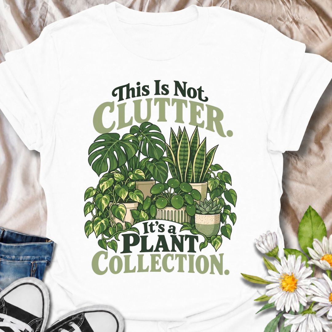 A funny houseplant T-shirt for anyone who insists their ever-growing greenery is a collection, not clutter. The phrase “This Is Not Clutter. It’s a Plant Collection.” pairs with a lush group of monstera, snake plants, pothos, pilea, and succulents for an instantly recognizable plant-lover design. It is perfect for plant parents, indoor gardeners, and houseplant collectors whose shelves and surfaces have slowly disappeared beneath pots. The bold botanical artwork keeps the design colorful, niche, and easy to