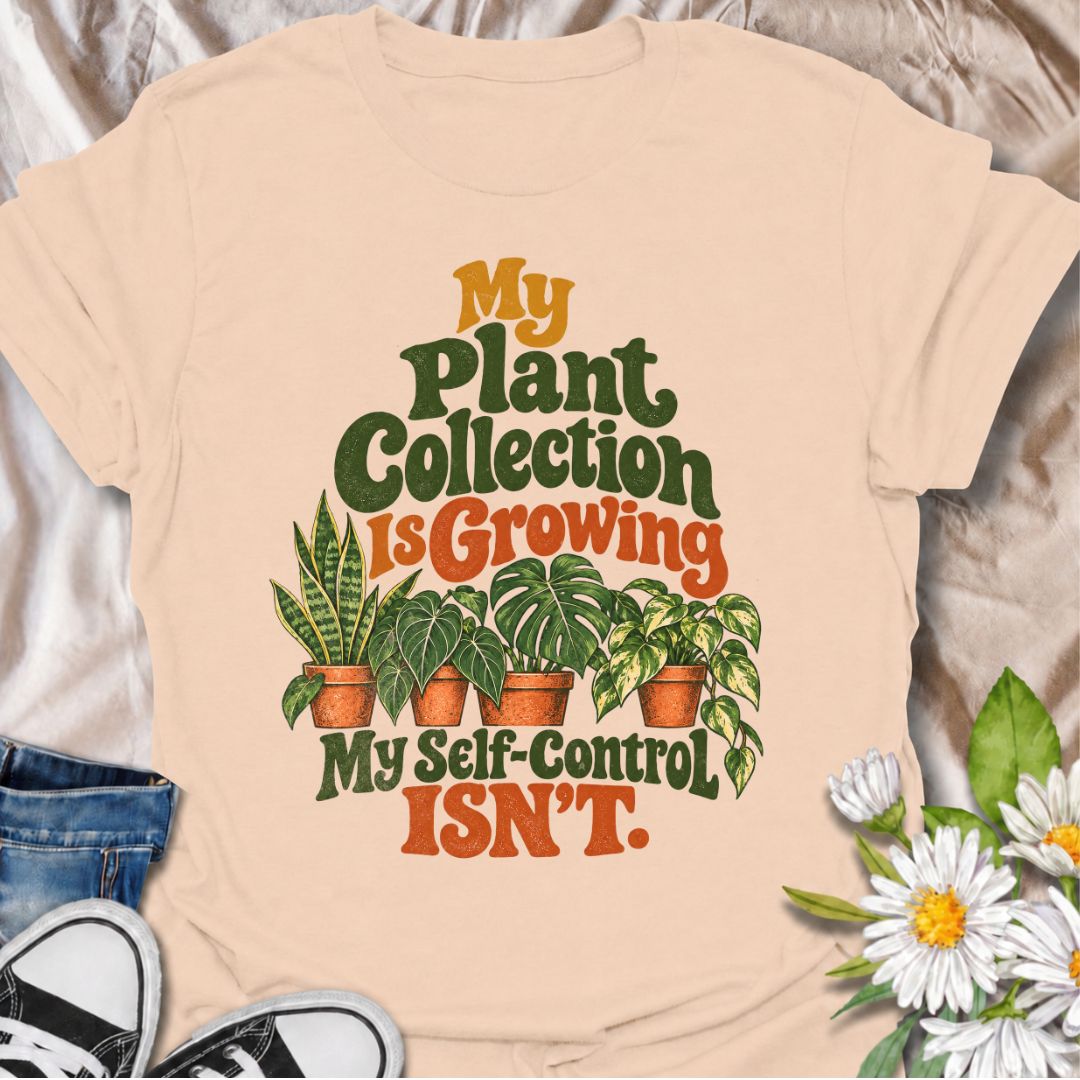 A funny plant T-shirt for anyone whose houseplant collection keeps getting bigger while their self-control heads in the opposite direction. The phrase “My Plant Collection Is Growing. My Self-Control Isn’t.” delivers relatable humor for plant parents, collectors, and nursery regulars who can never resist one more plant. Featuring a row of potted houseplants with bold retro typography, the design feels playful, warm, and easy to wear. It makes a great gift for monstera lovers, pothos fans, snake plant owners