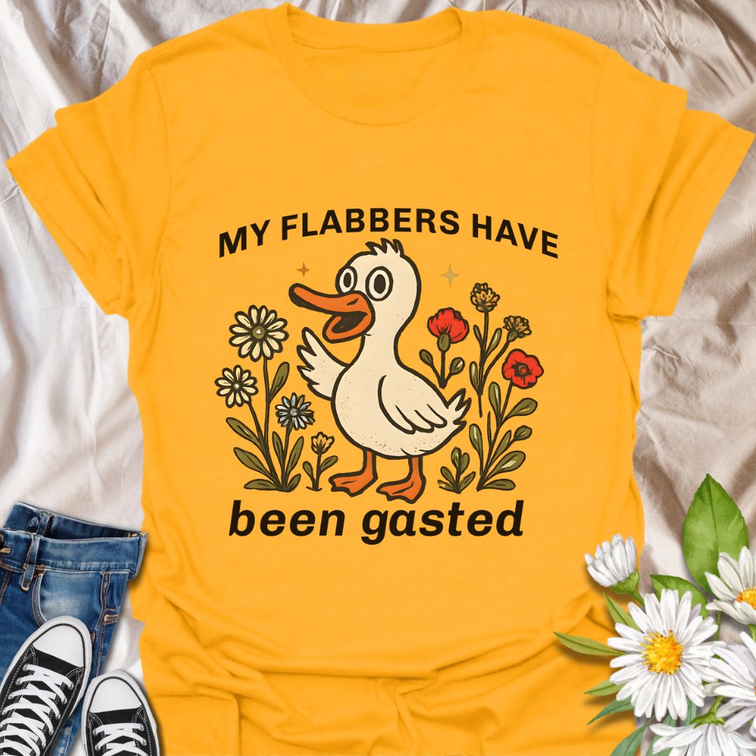 Add a splash of humor to your wardrobe with this quirky “My Flabbers Have Been Gasted” t-shirt featuring an adorable duck and whimsical flowers. A hilarious conversation starter and perfect gift for pun lovers, meme fans, or anyone who appreciates playful and unexpected expressions.