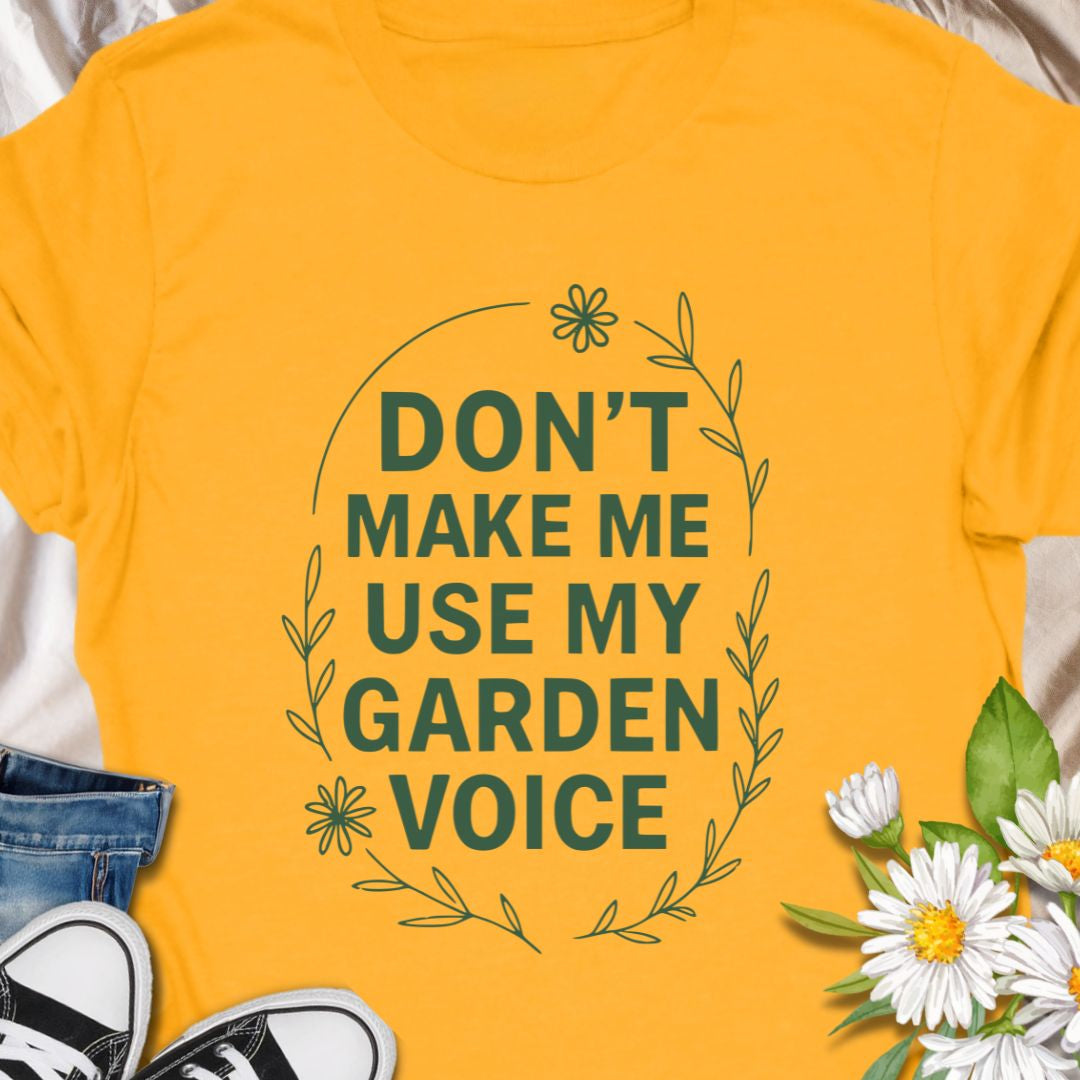 Let your garden attitude bloom with this funny “Don’t Make Me Use My Garden Voice” t-shirt. Ideal for gardeners who aren’t afraid to speak their mind—or to shout over the hedge! This tee makes a perfect gift for plant moms, green thumbs, or anyone who runs on coffee and compost.