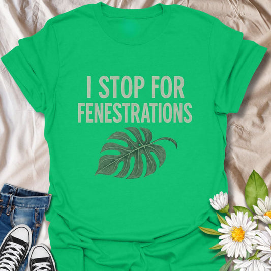 A clever shirt for houseplant lovers, this design reads “I Stop for Fenestrations” with a monstera leaf graphic. A niche favorite among indoor plant parents and rare foliage fans.