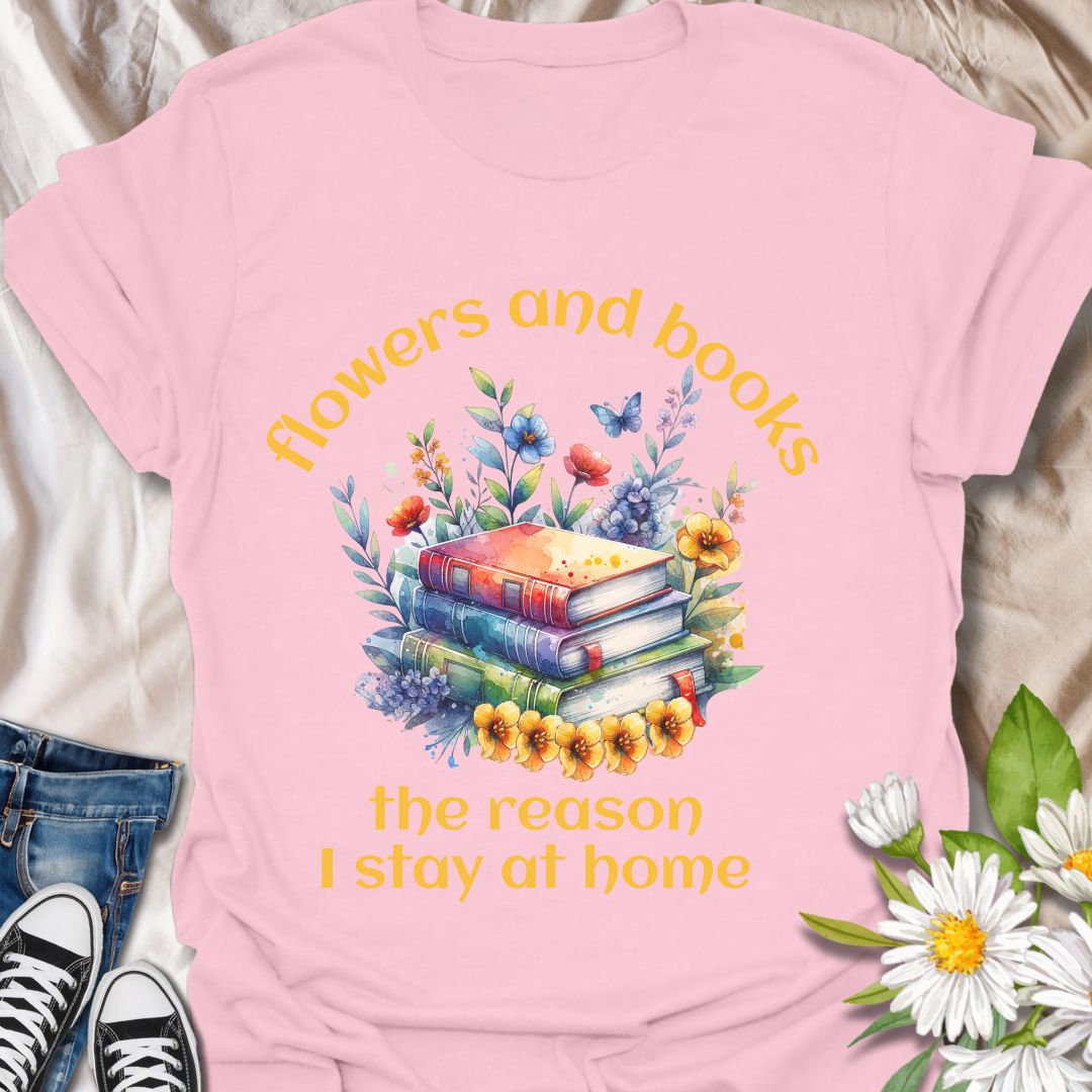 Bookworms and flower lovers unite! This charming t-shirt features a watercolor-style stack of books surrounded by blooms, with the quote “Flowers and books, the reason I stay at home.” A cozy choice for introverts and nature-loving readers.