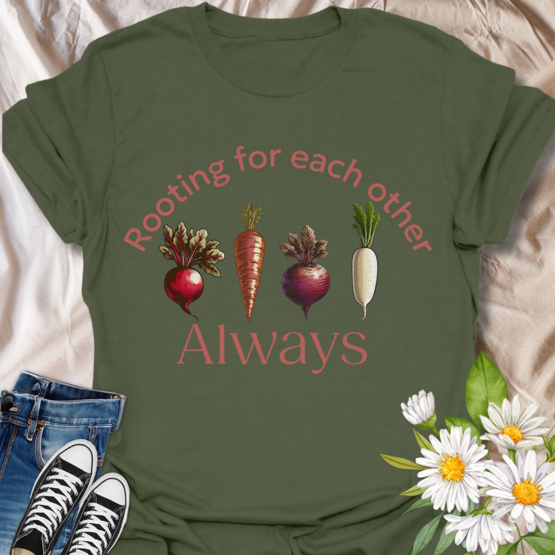 Playful vegetable pun t-shirt featuring carrots, beets, turnips, and radishes with the phrase ‘Rooting for each other always.’ A perfect gift for gardeners, veggie lovers, plant moms, and anyone who loves wholesome humor and plant-based designs