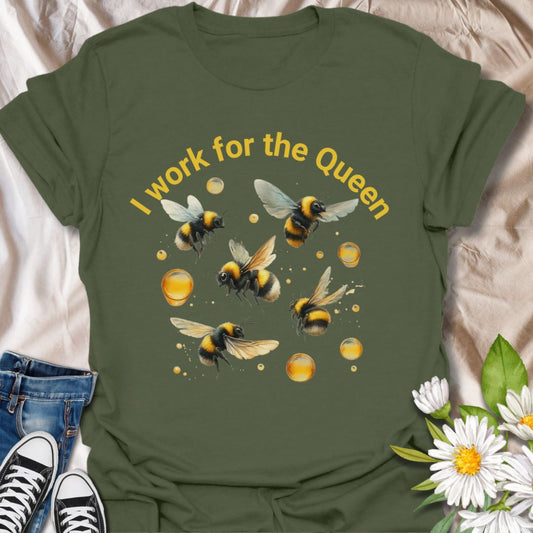 Fun "I Work for the Queen" bee t-shirt featuring vibrant flying bees and honeycomb accents on royal blue. Perfect for beekeepers, honey bee lovers, gardeners, pollinator enthusiasts, and nature fans. Great gift for plant moms, environmentalists, and anyone who loves saving the bees.