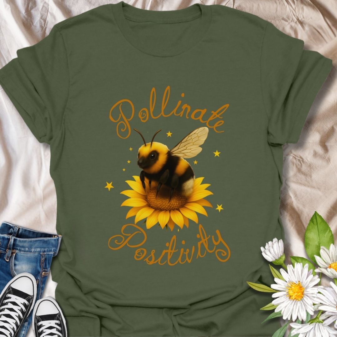 Pollinate Positivity t-shirt featuring a cute bumblebee on a bright sunflower, spreading good vibes and positive energy. Perfect bee lover shirt, nature-inspired graphic tee, gardening gift, or summer aesthetic outfit. Soft, lightweight, and ideal for women, teens, or anyone who loves bees, sunflowers, and inspirational quotes