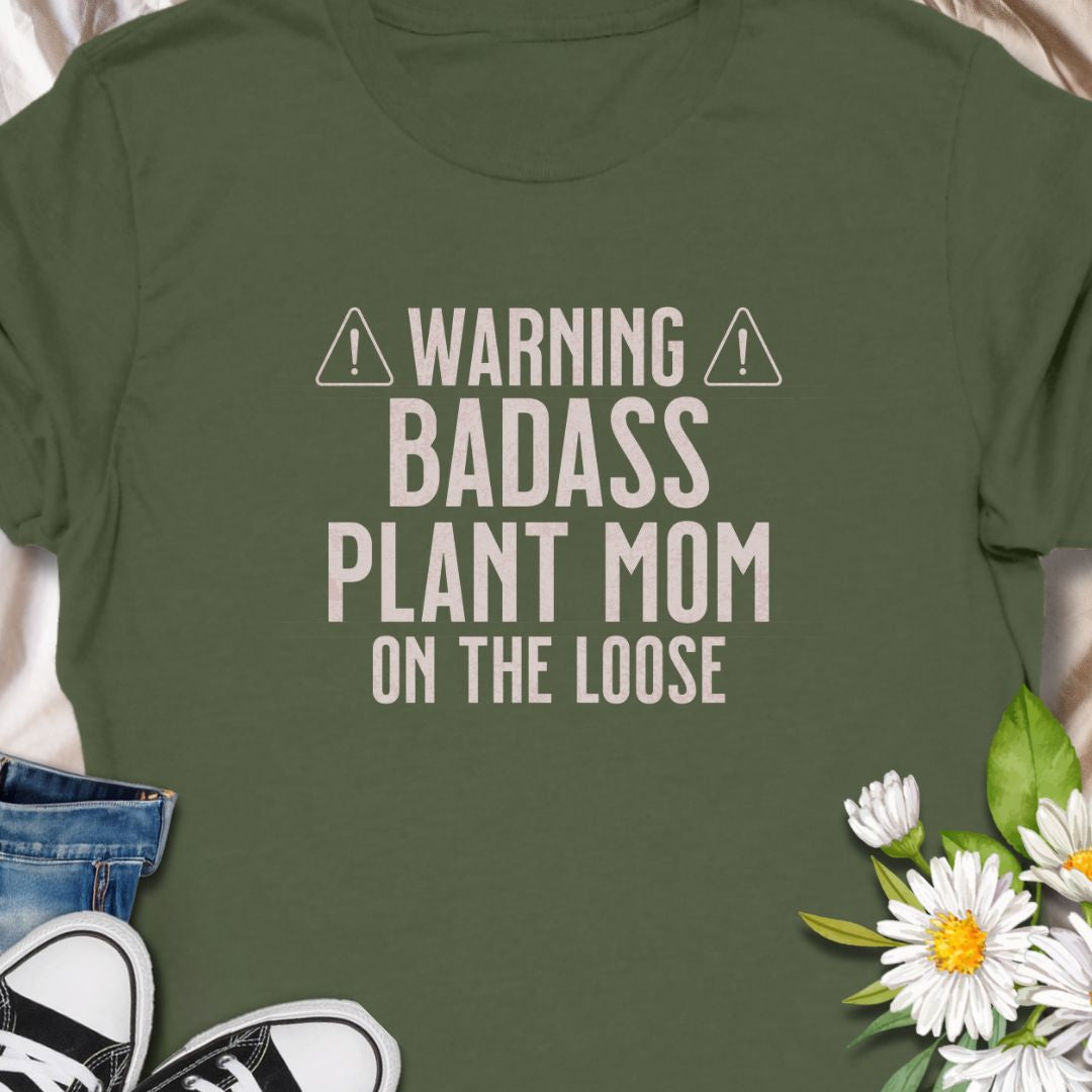Make way for the ultimate green queen! This "Warning: Badass Plant Mom on the Loose" tee is a fun, bold design perfect for confident plant lovers and indoor jungle owners. A great gift for fierce plant moms with serious leaf pride.