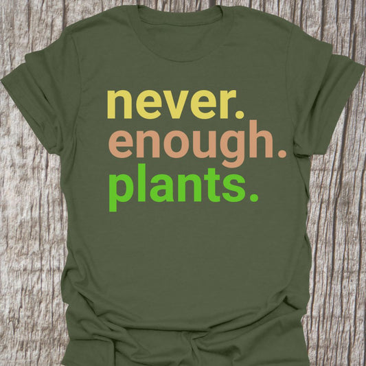 Text based design stating 'never enough plants' over three lines.  Written in three colors on a military green t-shirt