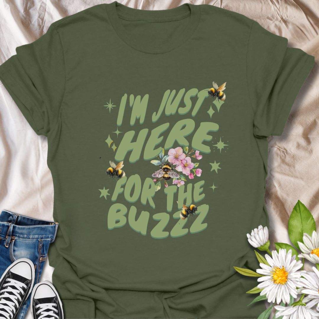 Celebrate your love for bees and humor with this fun "I'm Just Here for the Buzz" design. Adorned with buzzing bees, flowers, and playful lettering, it's perfect for bee enthusiasts, gardeners, or anyone who loves a good pun.