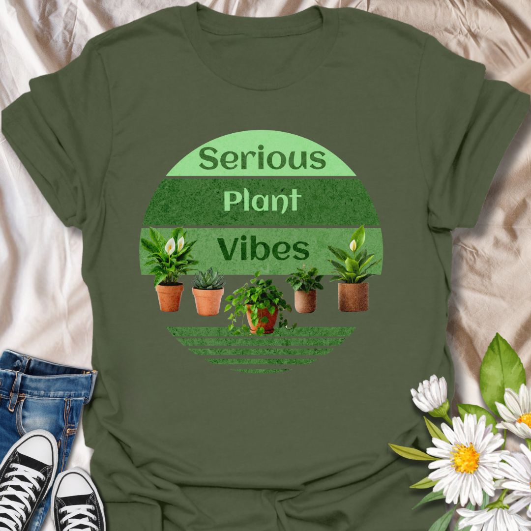 “Serious Plant Vibes” t-shirt featuring vibrant potted houseplants in a retro green circle design. Perfect for plant moms, gardeners, and houseplant enthusiasts who love their leafy friends. A fun botanical tee for indoor plant lovers and green thumbs.