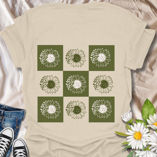 Bring sunny vibes to your wardrobe with this sunflower grid t-shirt. Featuring a rustic botanical design in earthy tones, it’s perfect for plant lovers, nature enthusiasts, or anyone who blooms where they're planted. Soft and stylish 