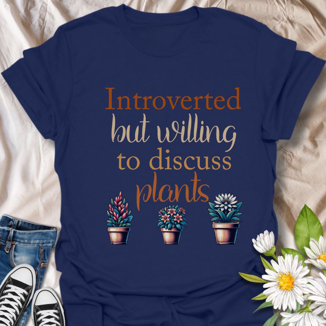 Show off your quiet nature and leafy passions with this “Introverted but Willing to Discuss Plants” t-shirt. Featuring charming potted succulents and playful fonts, it’s perfect for plant lovers who prefer petals over people.