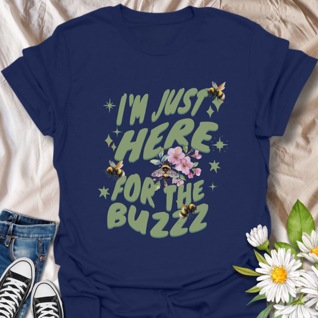 Celebrate your love for bees and humor with this fun "I'm Just Here for the Buzz" design. Adorned with buzzing bees, flowers, and playful lettering, it's perfect for bee enthusiasts, gardeners, or anyone who loves a good pun.