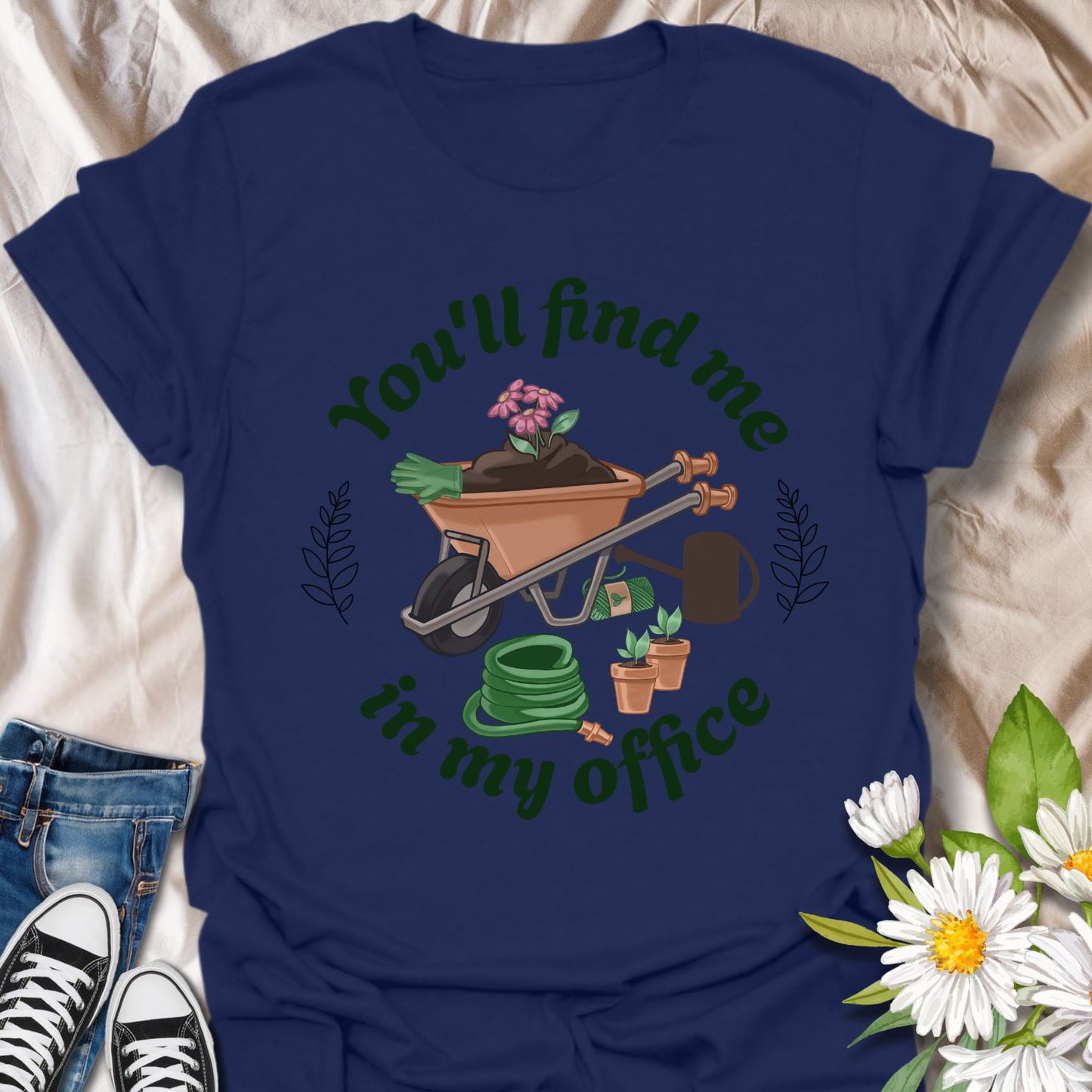 Show the world where you really get your work done—with dirt on your hands and plants in bloom! This playful “You'll Find Me in My Office” tee is perfect for gardeners who call the outdoors their cubicle.