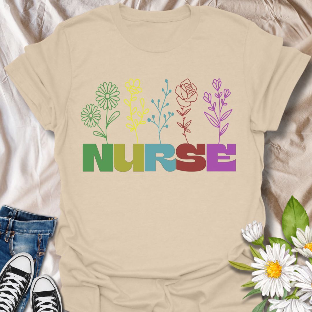 Celebrate caring in color with this rainbow floral "NURSE" t-shirt. A vibrant and heartfelt gift for nurses who bring healing and compassion. Perfect for Nurse Appreciation Week, graduations, or everyday pride.