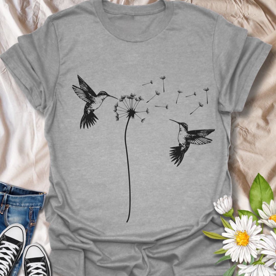 Capture the beauty of nature with this elegant design featuring hummingbirds and dandelion seeds drifting on the breeze. A perfect gift for bird lovers, gardeners, and anyone who loves peaceful, nature-inspired art.