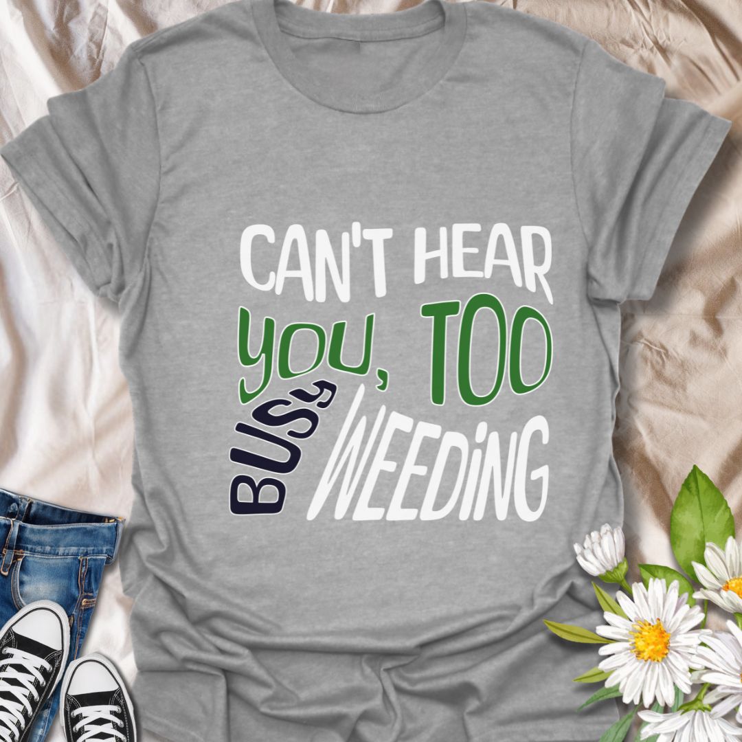 Funny gardening t-shirt with bold "Can't Hear You, Too Busy Weeding" quote. Perfect for garden lovers, plant enthusiasts, weed-pulling warriors, and outdoor hobbyists. Great gift for gardeners with a sense of humor who love spending time in their garden.