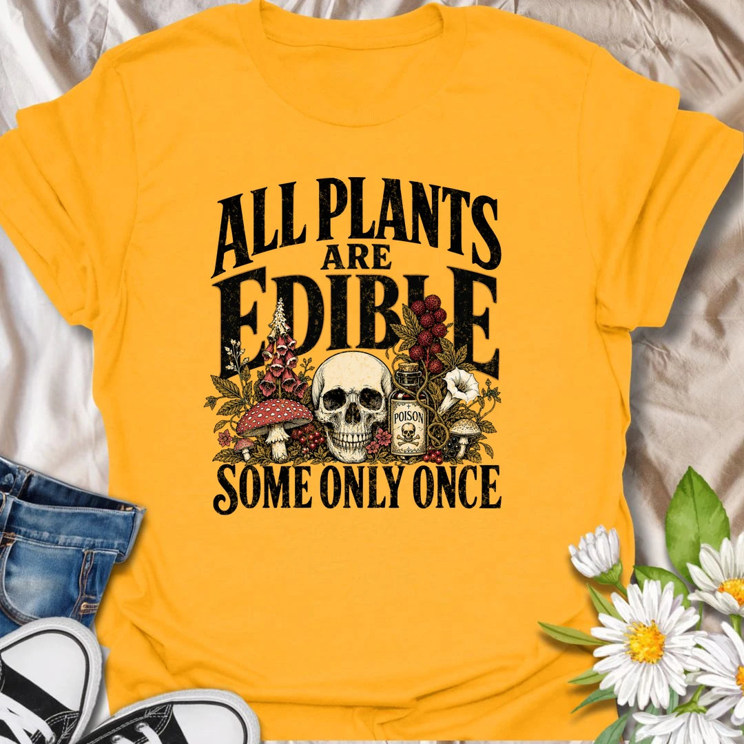 All Plants Are Edible t-shirt for plant lovers with a dark sense of humor and a love for botanical warnings.
The bold vintage-style design features mushrooms, plants, and skull artwork for a funny garden-meets-goth look.
It is perfect for gardeners, houseplant fans, mushroom lovers, and anyone who appreciates slightly twisted plant humor.
A fun gift for plant people who know some greenery should definitely be admired, not tasted.