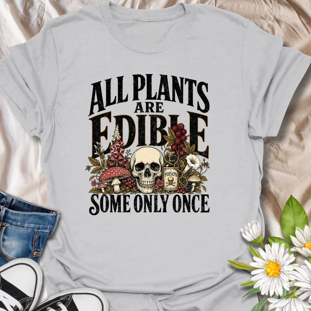 All Plants Are Edible t-shirt for plant lovers with a dark sense of humor and a love for botanical warnings.
The bold vintage-style design features mushrooms, plants, and skull artwork for a funny garden-meets-goth look.
It is perfect for gardeners, houseplant fans, mushroom lovers, and anyone who appreciates slightly twisted plant humor.
A fun gift for plant people who know some greenery should definitely be admired, not tasted.