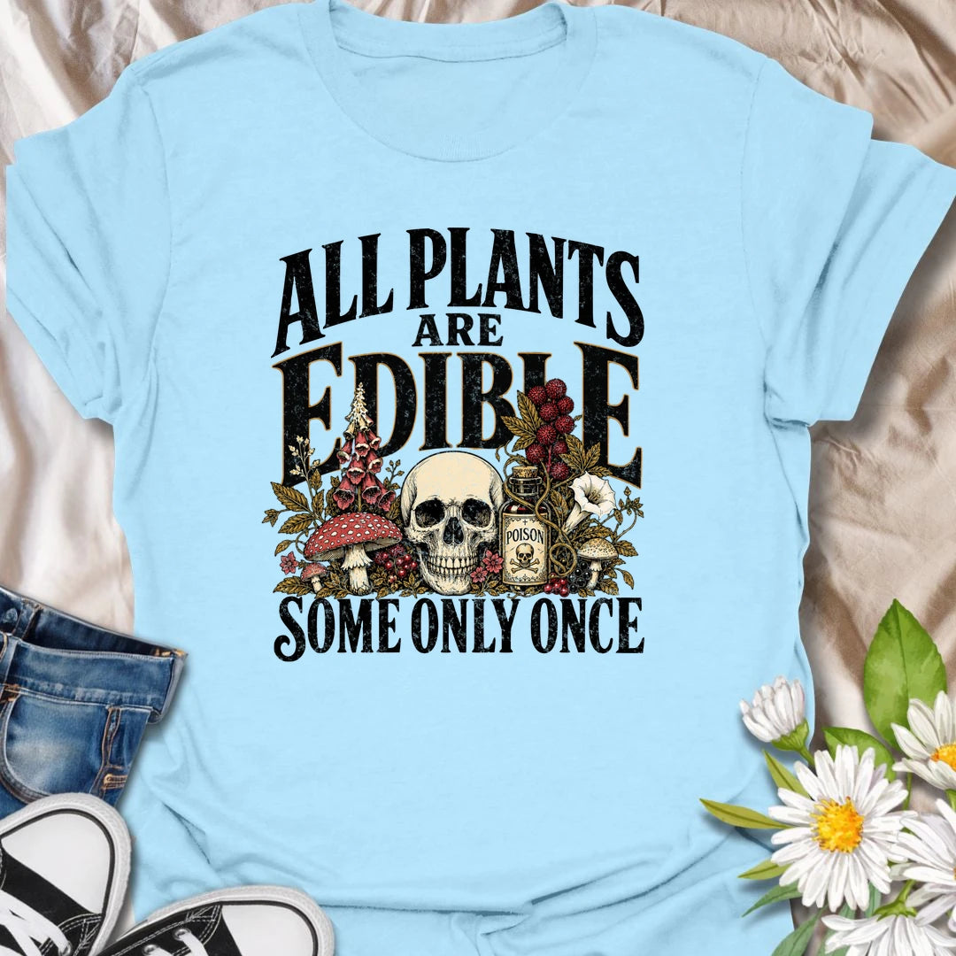 All Plants Are Edible t-shirt for plant lovers with a dark sense of humor and a love for botanical warnings.
The bold vintage-style design features mushrooms, plants, and skull artwork for a funny garden-meets-goth look.
It is perfect for gardeners, houseplant fans, mushroom lovers, and anyone who appreciates slightly twisted plant humor.
A fun gift for plant people who know some greenery should definitely be admired, not tasted.