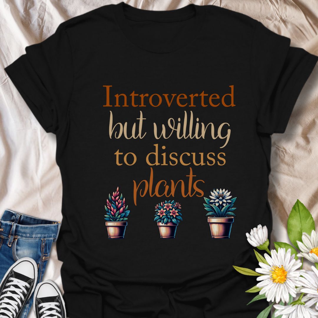 Show off your quiet nature and leafy passions with this “Introverted but Willing to Discuss Plants” t-shirt. Featuring charming potted plants and playful fonts, it’s perfect for plant lovers who prefer petals over people.