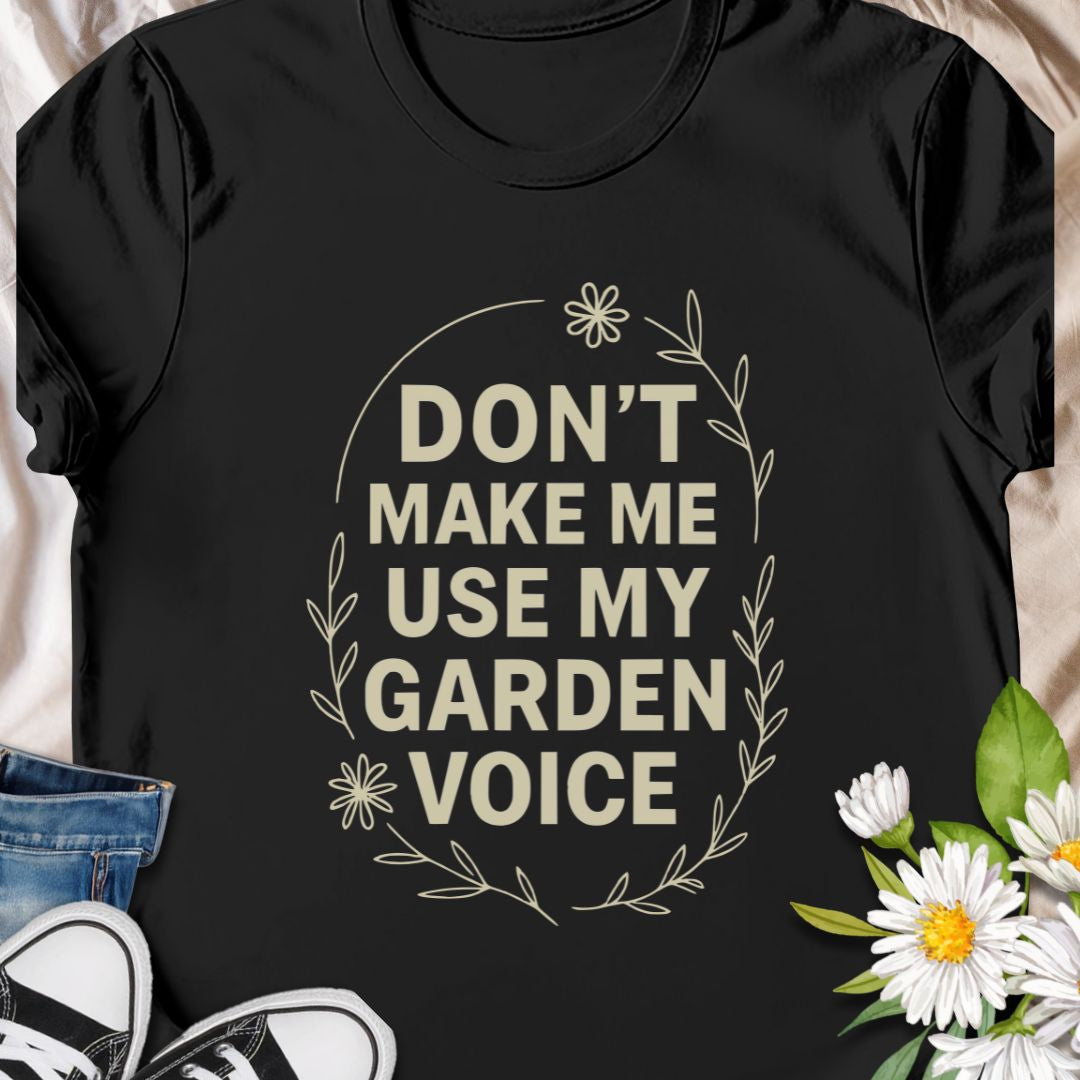 Let your garden attitude bloom with this funny “Don’t Make Me Use My Garden Voice” t-shirt. Ideal for gardeners who aren’t afraid to speak their mind—or to shout over the hedge! This tee makes a perfect gift for plant moms, green thumbs, or anyone who runs on coffee and compost.