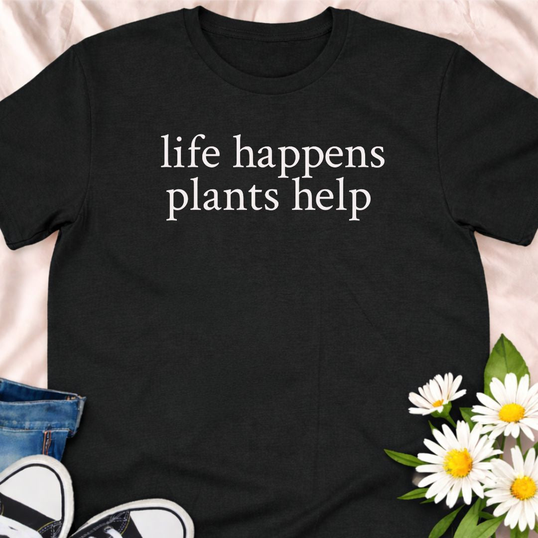 Life happens, plants help. This minimalist botanical t-shirt is designed for plant lovers, gardeners, and anyone who finds comfort in greenery. A calm, thoughtful tee that celebrates nature, self-care, and the healing power of plants.