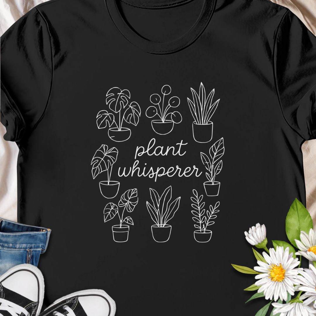 Speak fluent foliage with this "Plant Whisperer" t-shirt – a minimalist, hand-drawn design perfect for indoor plant lovers, proud plant parents, and botanical enthusiasts. A stylish and subtle gift for houseplant collectors and green-thumbed friends.