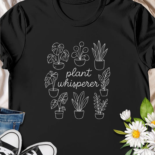 Speak fluent foliage with this "Plant Whisperer" t-shirt – a minimalist, hand-drawn design perfect for indoor plant lovers, proud plant parents, and botanical enthusiasts. A stylish and subtle gift for houseplant collectors and green-thumbed friends.