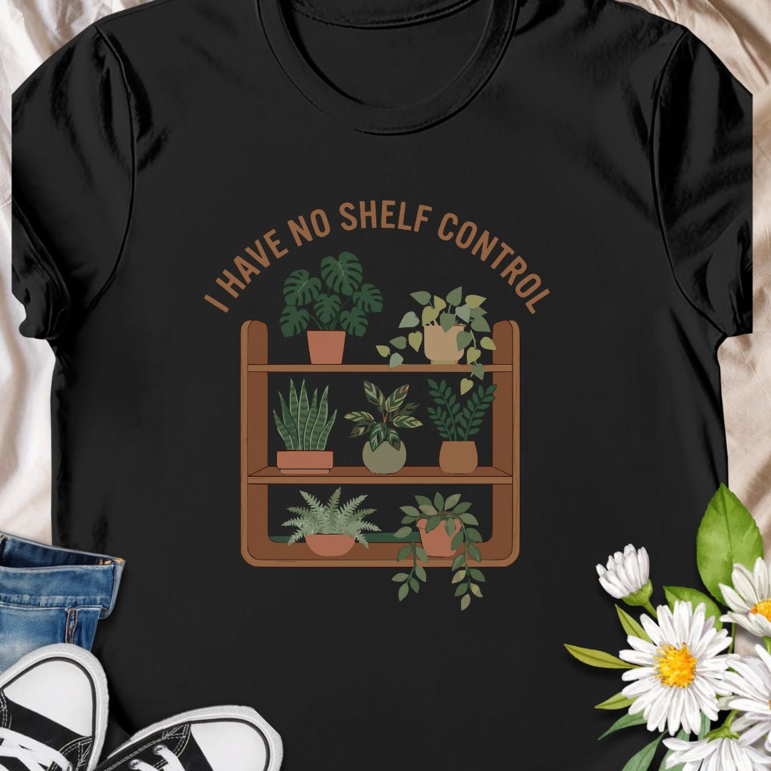 Celebrate your love for plants and witty humor with this “I Have No Shelf Control” t-shirt, featuring a cozy plant shelf filled with greenery. Perfect for houseplant lovers, plant collectors, and green-thumbed decor enthusiasts. A must-have for anyone who keeps adding plants to their shelves—no regrets!