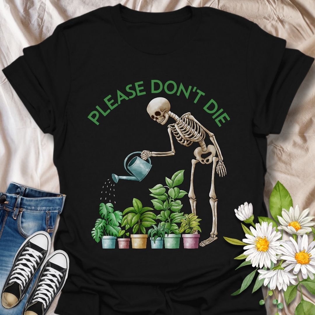 Funny plant lover t-shirt featuring a skeleton watering houseplants with the phrase 'Please don't die.' A dark humor gardening tee perfect for plant parents, indoor jungle fans, and anyone with a green thumb and a sense of humor. Great gift for plant moms, goth gardeners, and sarcastic plant enthusiasts. Black