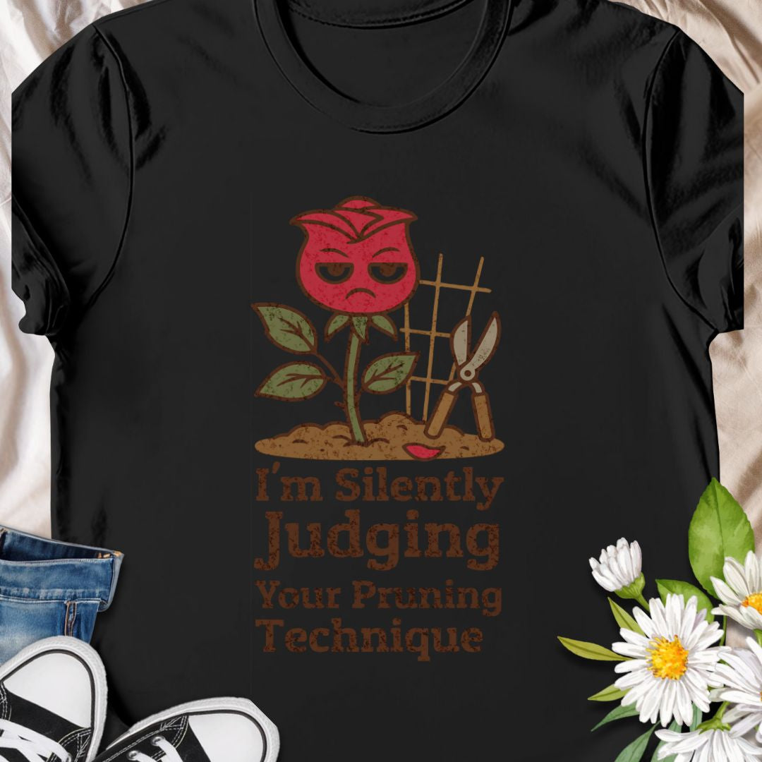 Bring humor to the garden with this “I’m Silently Judging Your Pruning Technique” shirt featuring a sassy red rose. Perfect for gardeners who love their plants trimmed just right and have a sense of humor to match. Makes a great gift for plant lovers and gardening enthusiasts.