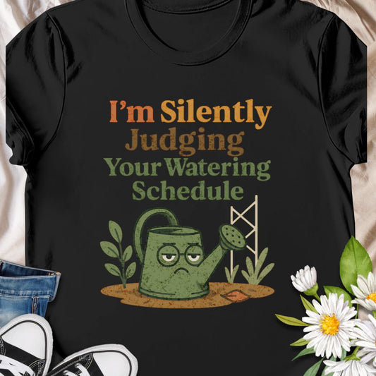 Show off your plant-parent sass with this “I’m Silently Judging Your Watering Schedule” tee featuring a grumpy watering can. A hilarious gift for  moms, dads, grandparents, anyone who enjoys their garden.  This tee shows a love for keeping  leafy friends happy, in a sarcastic way.   Ideal for houseplant lovers and garden geeks alike.