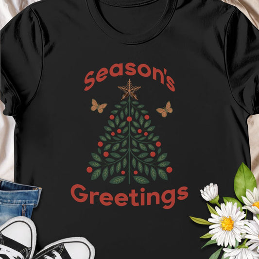 Spread festive cheer with this charming “Season’s Greetings” t-shirt featuring a leafy Christmas tree and butterflies. A unique and nature-inspired holiday tee perfect for garden lovers and anyone who celebrates the season in style.